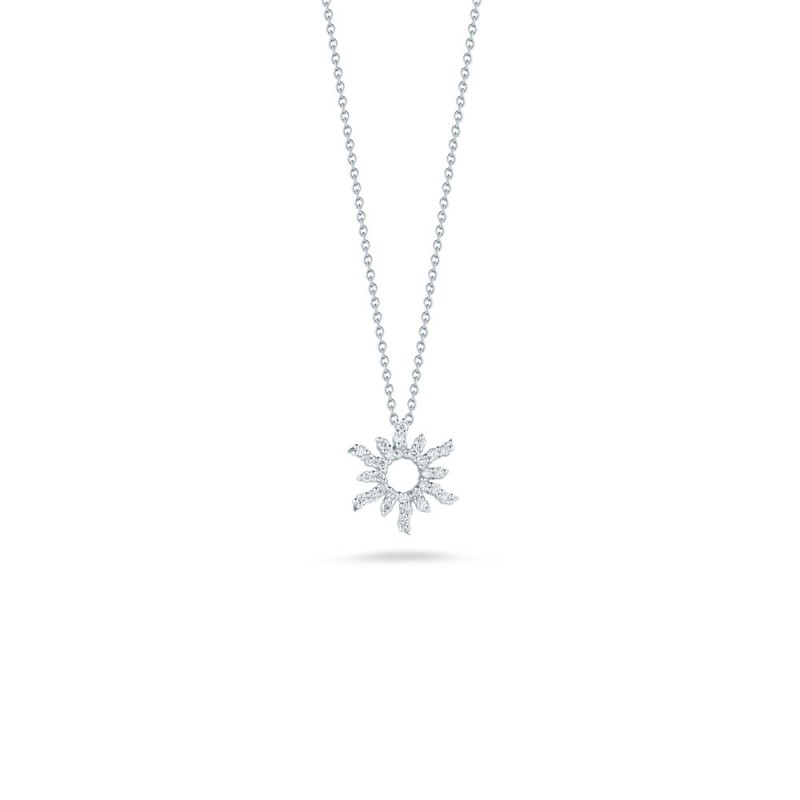 18KT WHITE GOLD DIAMOND SUN, .17CT.