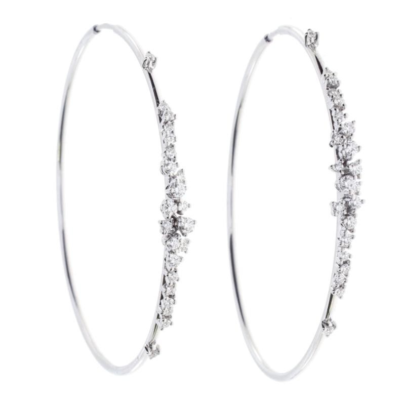 Damiani 18k white gold diamond earrings .65ctw. 