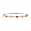 The Battery Park Garnet and Diamond Flower Bracelet in 14K Yellow Gold.