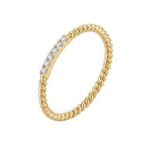 The Broadway Stackable Twist Ring in 14K Yellow Gold with Diamonds.