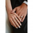 The Diamond Jim Channel-Set Diamond Wedding Band in 14K Yellow Gold (1K Round).