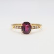Laurenti 18k yellow gold ruby and diamond ring .81ctw ruby .10ctw diamond.