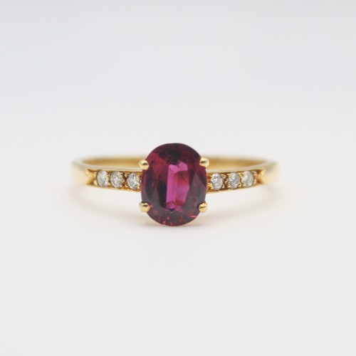 Laurenti 18k yellow gold ruby and diamond ring .81ctw ruby .10ctw diamond.