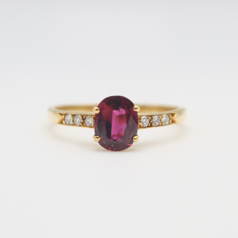 Laurenti 18k yellow gold ruby and diamond ring .81ctw ruby .10ctw diamond.