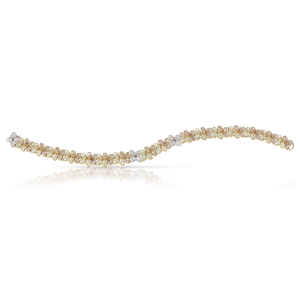 Ama Tennis Bracelet in 18k Rose, White and Yellow Gold with White and Champagne Diamonds.