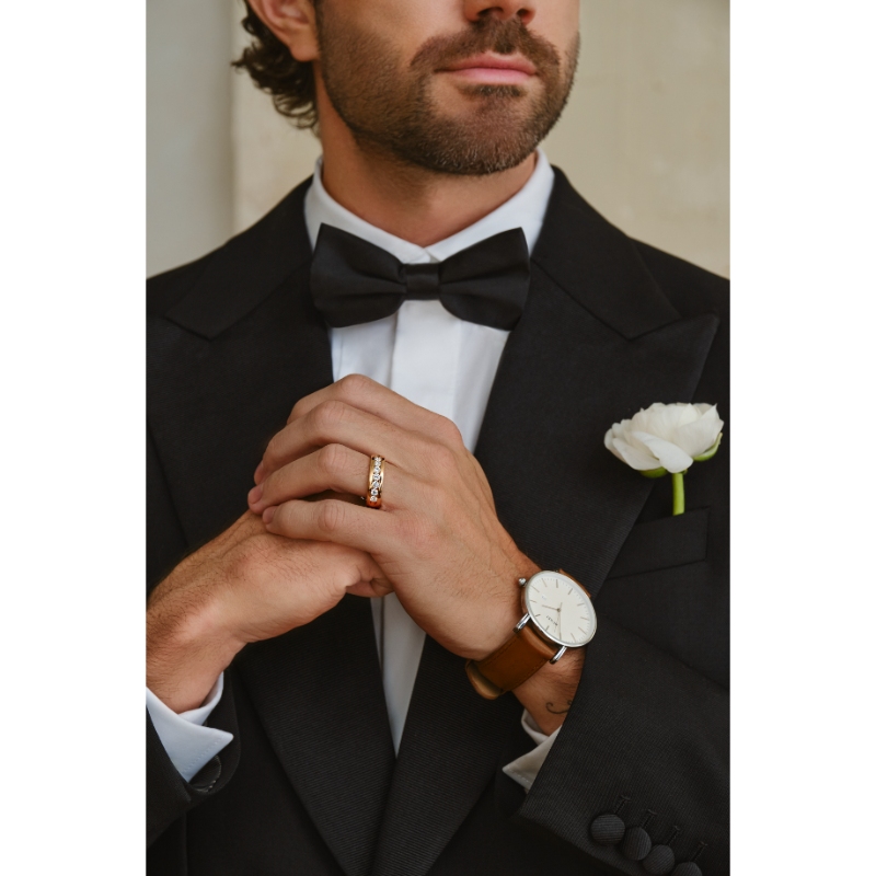 The Diamond Jim Channel-Set Men's Wedding Band in 14K White Gold (.5K Round Cut).